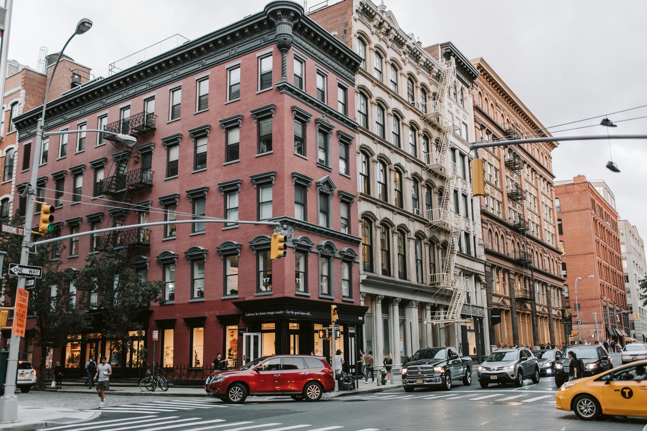 Historic cast-iron buildings in SoHo Manhattan, showcasing classic lofts and real estate.