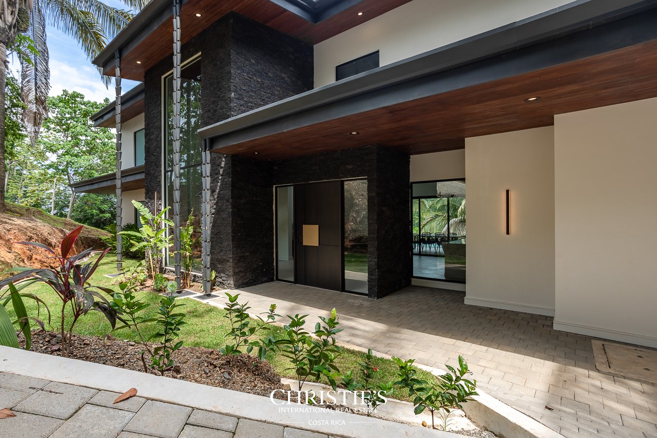 Modern Tropical Ocean & Mountain View Home