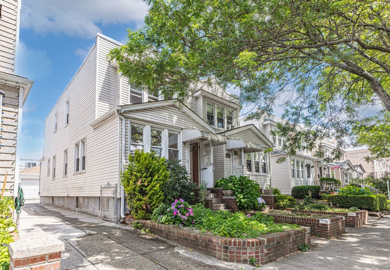 One family home at 6929 67th Pl in Ridgewood Queens sold by The Parviz Team at Compass.