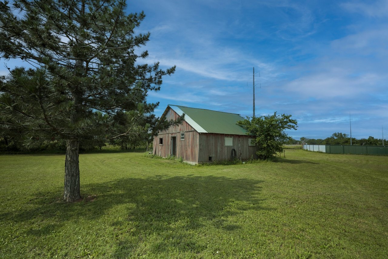 Just Listed: 7.57-Acre Property with a Shop, Barn, Softball Fields, and More!