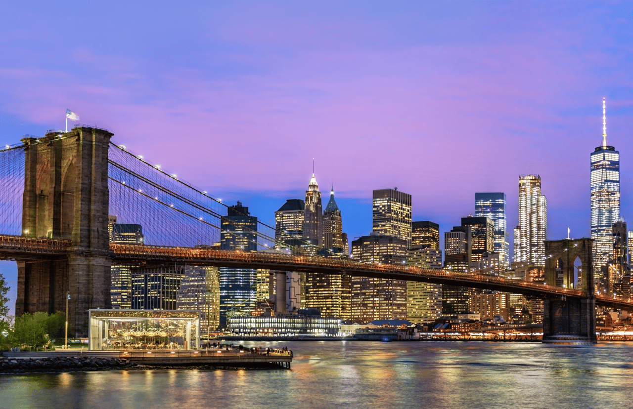 Brooklyn Bridge and Manhattan at sunset.