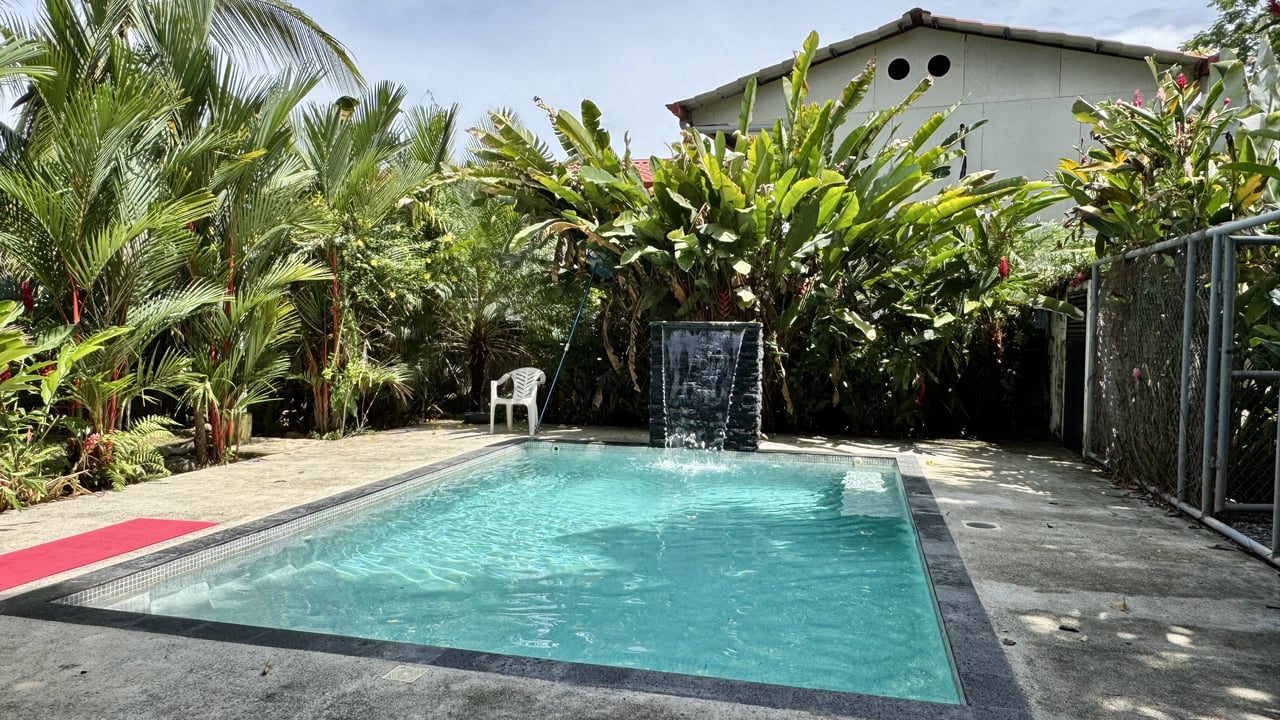 2 Commercial Property in the Heart of Uvita with an existing Home.  