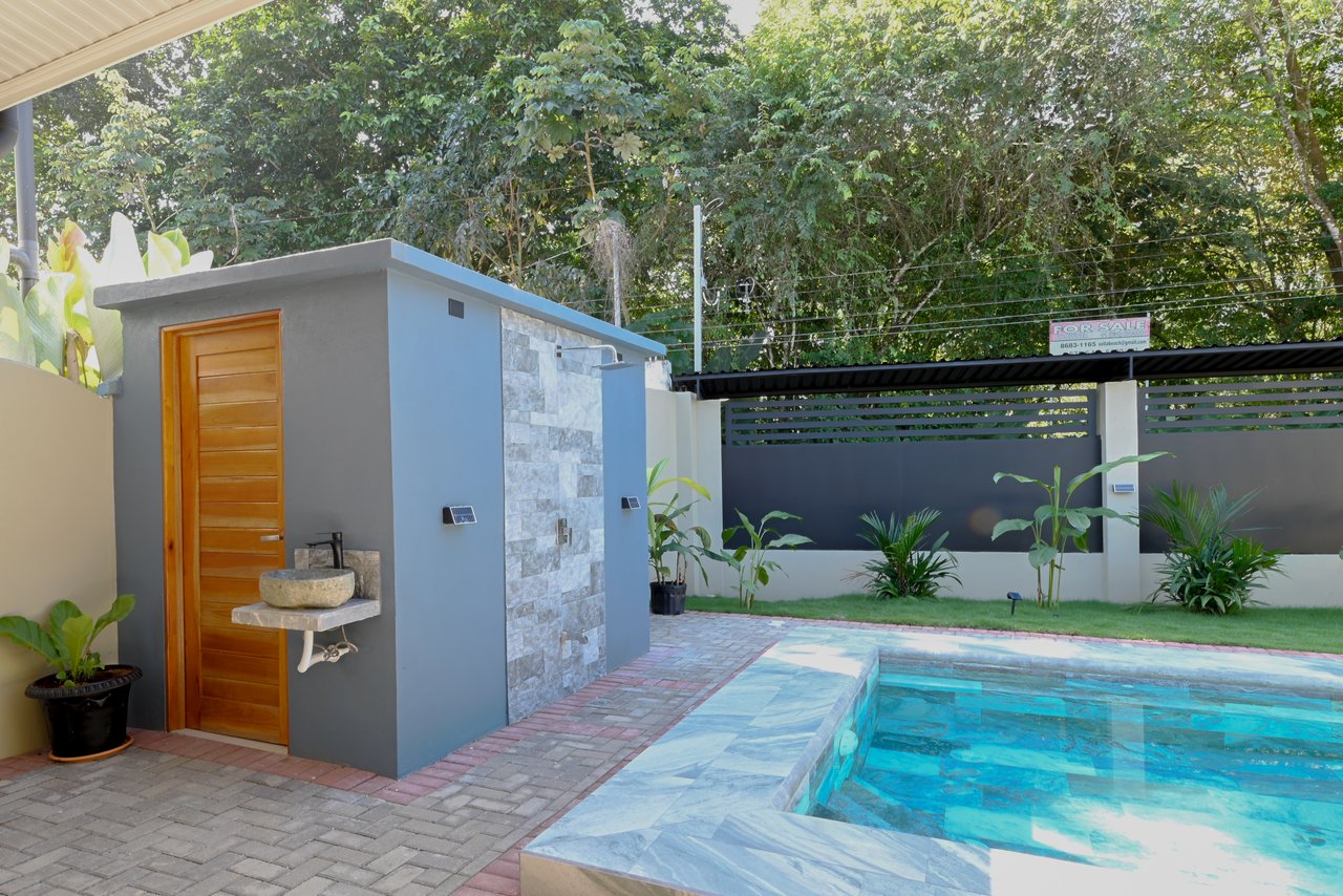 Modern Coastal Luxury: New 3-Bedroom Home Steps from South Pacific Beach