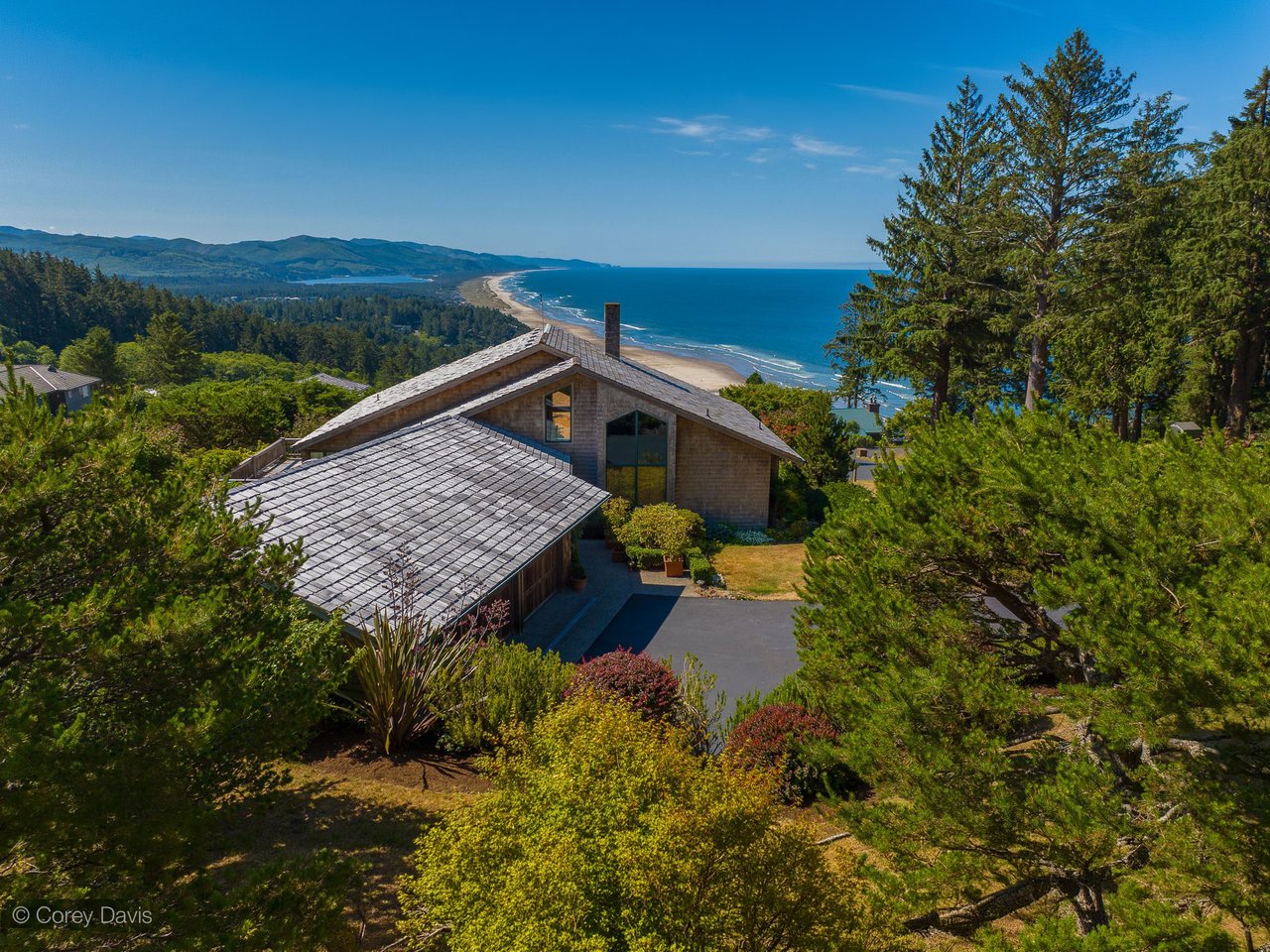 Exterior view of the sold custom coastal home at 38680 Meadow Loop in the Neahkahnie area of Manzanita, Oregon