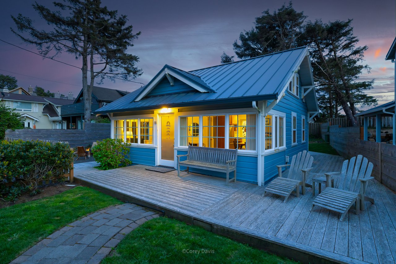 Sold vintage cottage at 56 Idaho Ave in Manzanita, Oregon, represented by Meadow Davis of Home + Sea Realty, with ocean views and beach access nearby.