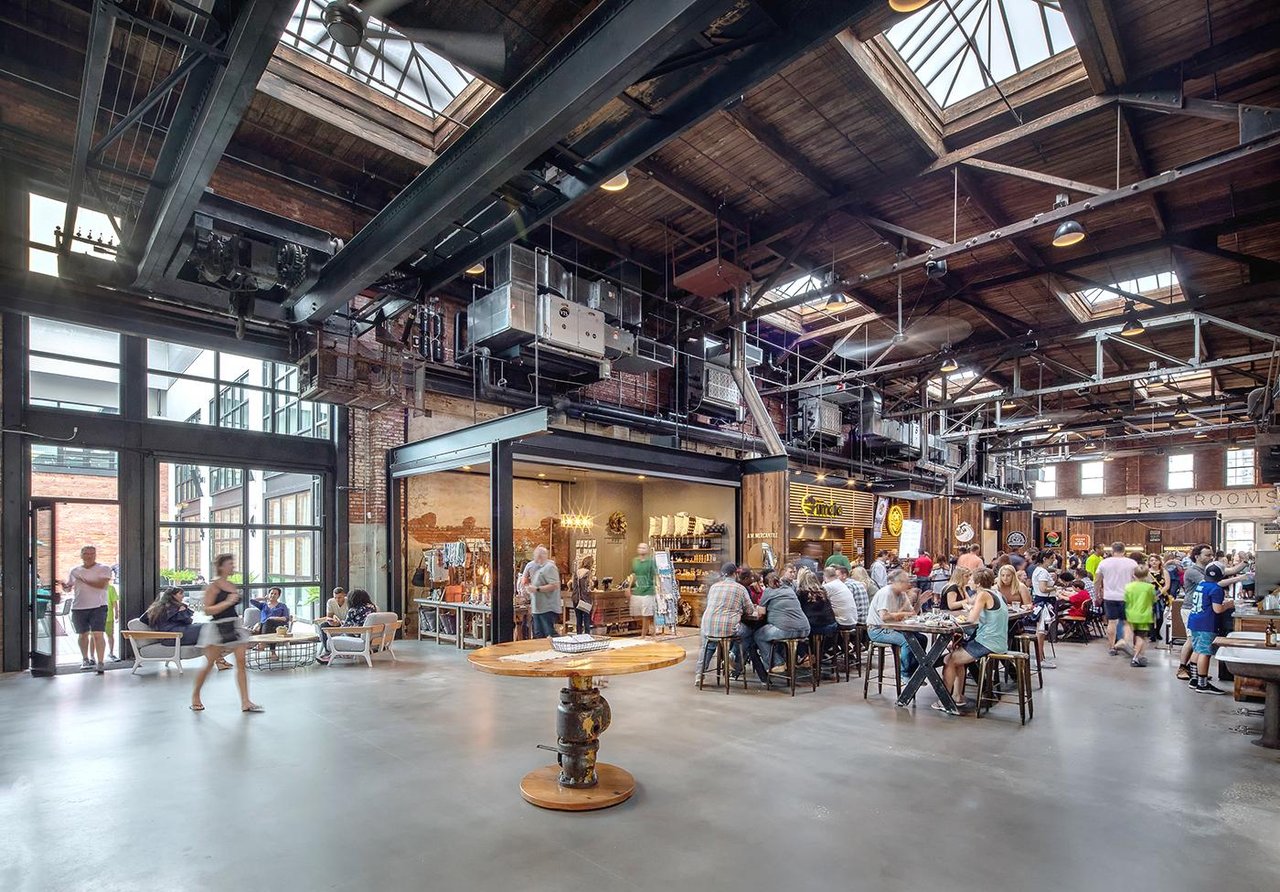 Armature Works in Tampa Heights featuring restaurants and social gathering spaces along the Hillsborough River.