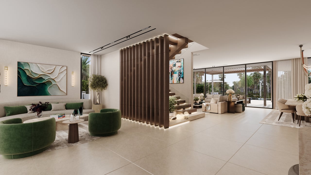 Open-plan living room with green seating, a sculptural wood staircase, and glass doors to a palm-lined patio.