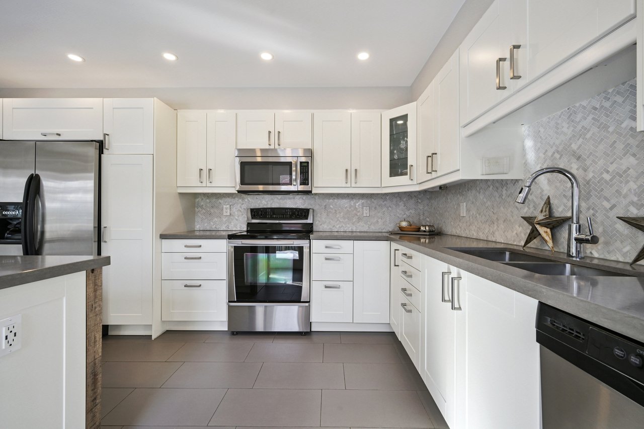 Sun-Filled Sophistication on a Rare Pie-Shaped Lot in West Oak Trails