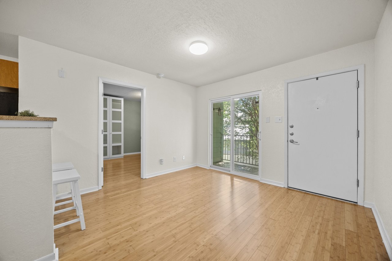 Top-Floor Condo Retreat in Gated Ivy Condos | Private Balcony + Tree-Filled Views