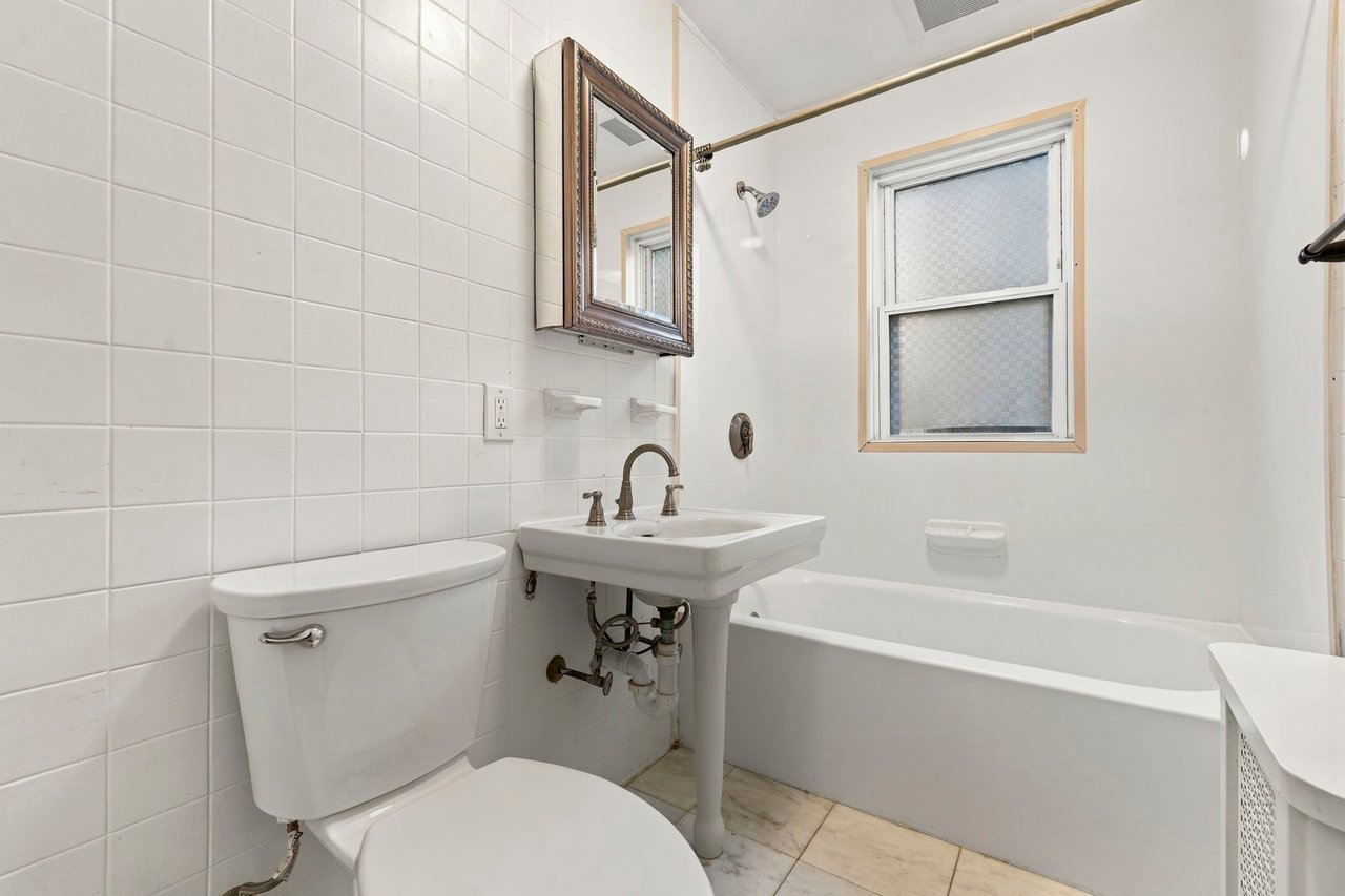 A Rare Two-Family Generational Asset with a Private Entrance to the Arnold Arboretum