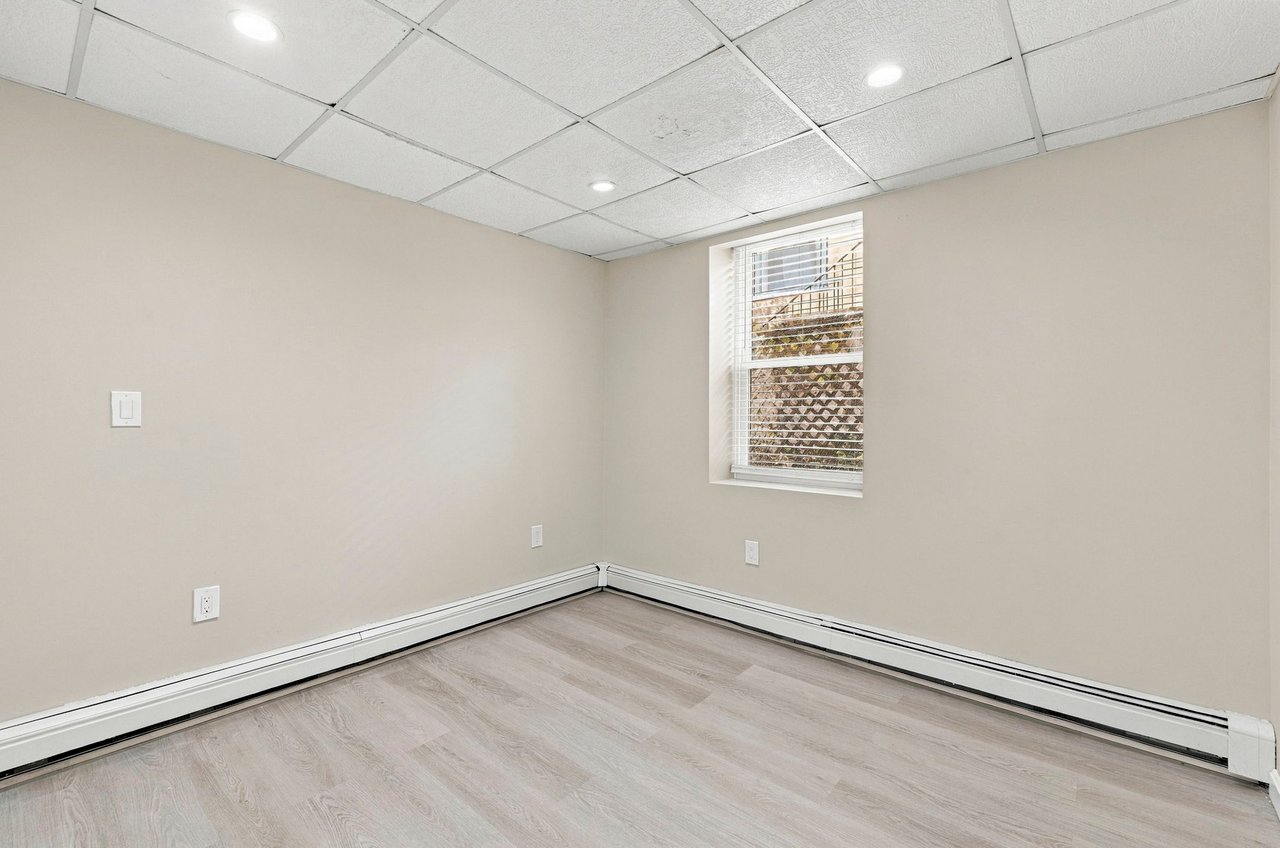 A Rare Two-Family Generational Asset with a Private Entrance to the Arnold Arboretum