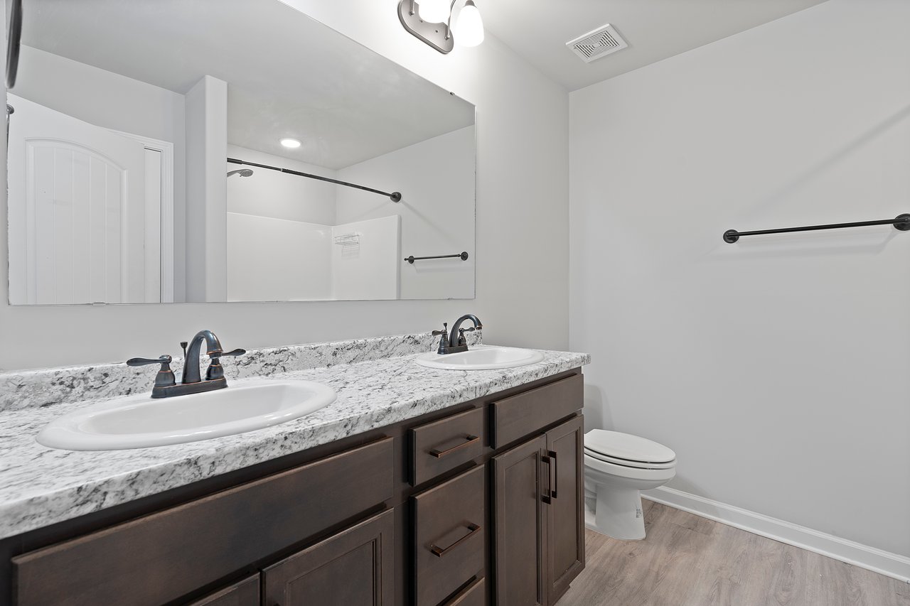 Charming Toney Home with Fenced in Yard & Amenities