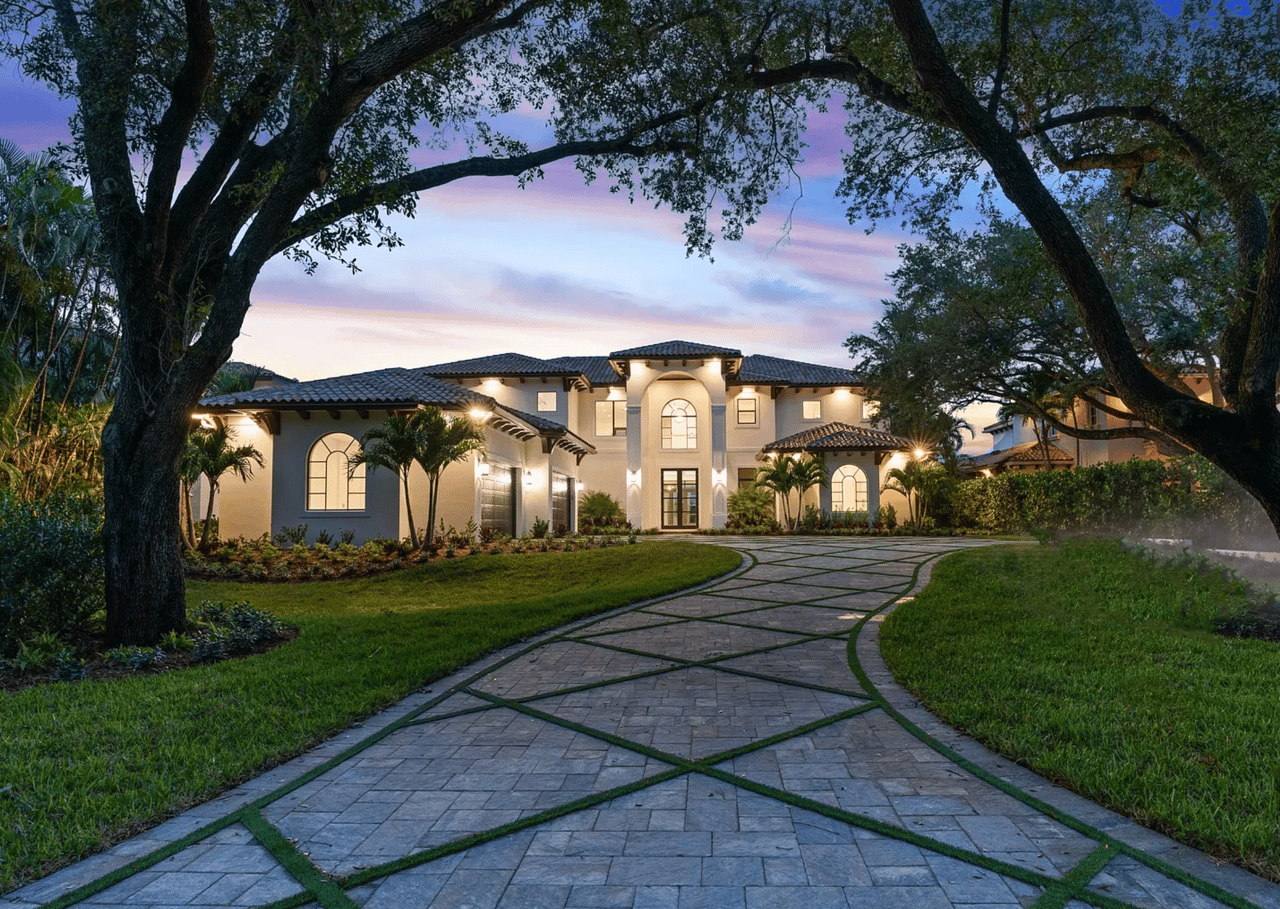 Elegant luxury waterfront estate perfect for vacation home investment, second home ownership, or corporate retreat — Luxury Property Fund, founded by Eric Radecki.