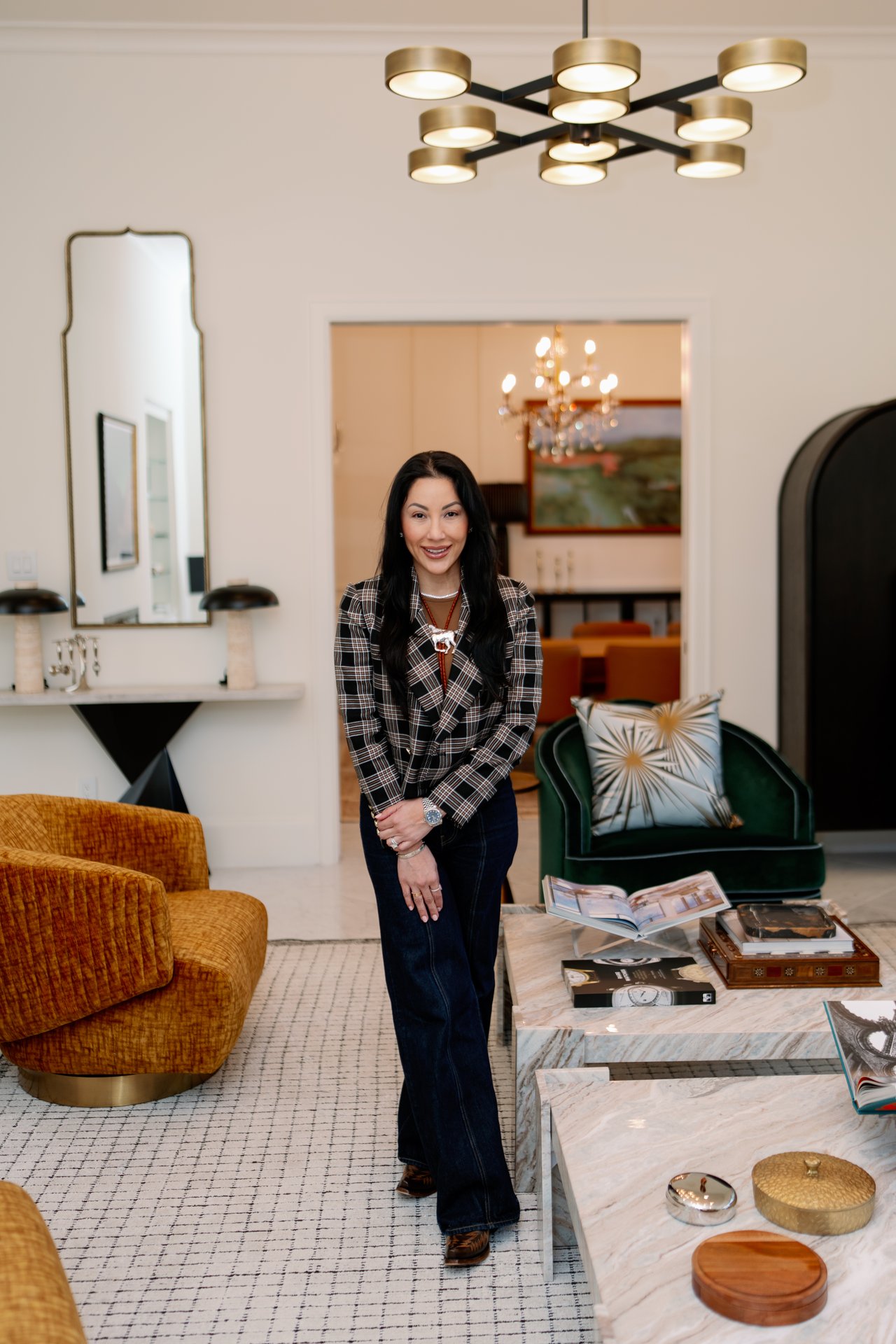 Nancy Almodovar, CEO of Nan and Company Properties inside a luxury home's living room