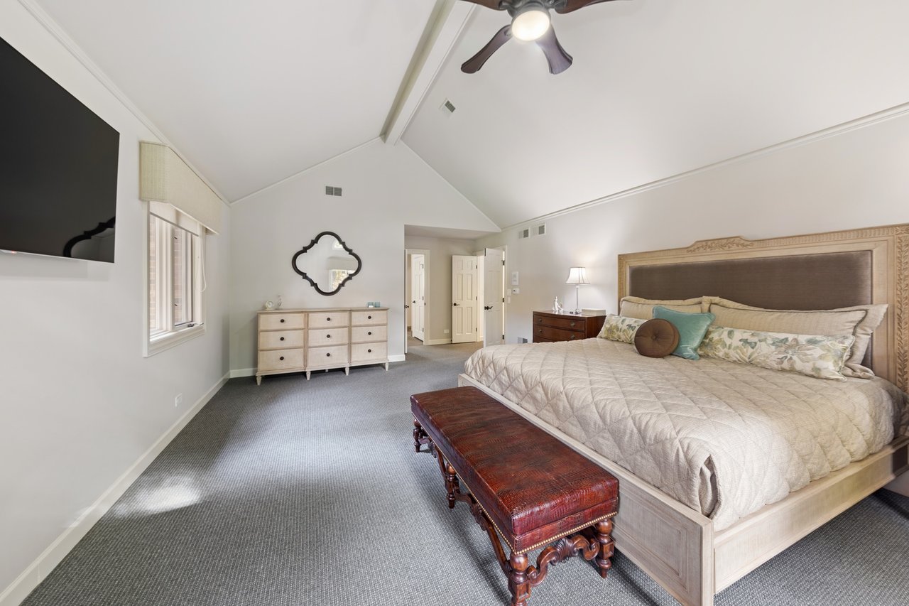 Beautifully Appointed Home in a Gated Community on Over an Acre of Professionally Landscaped Grounds with Pond Views