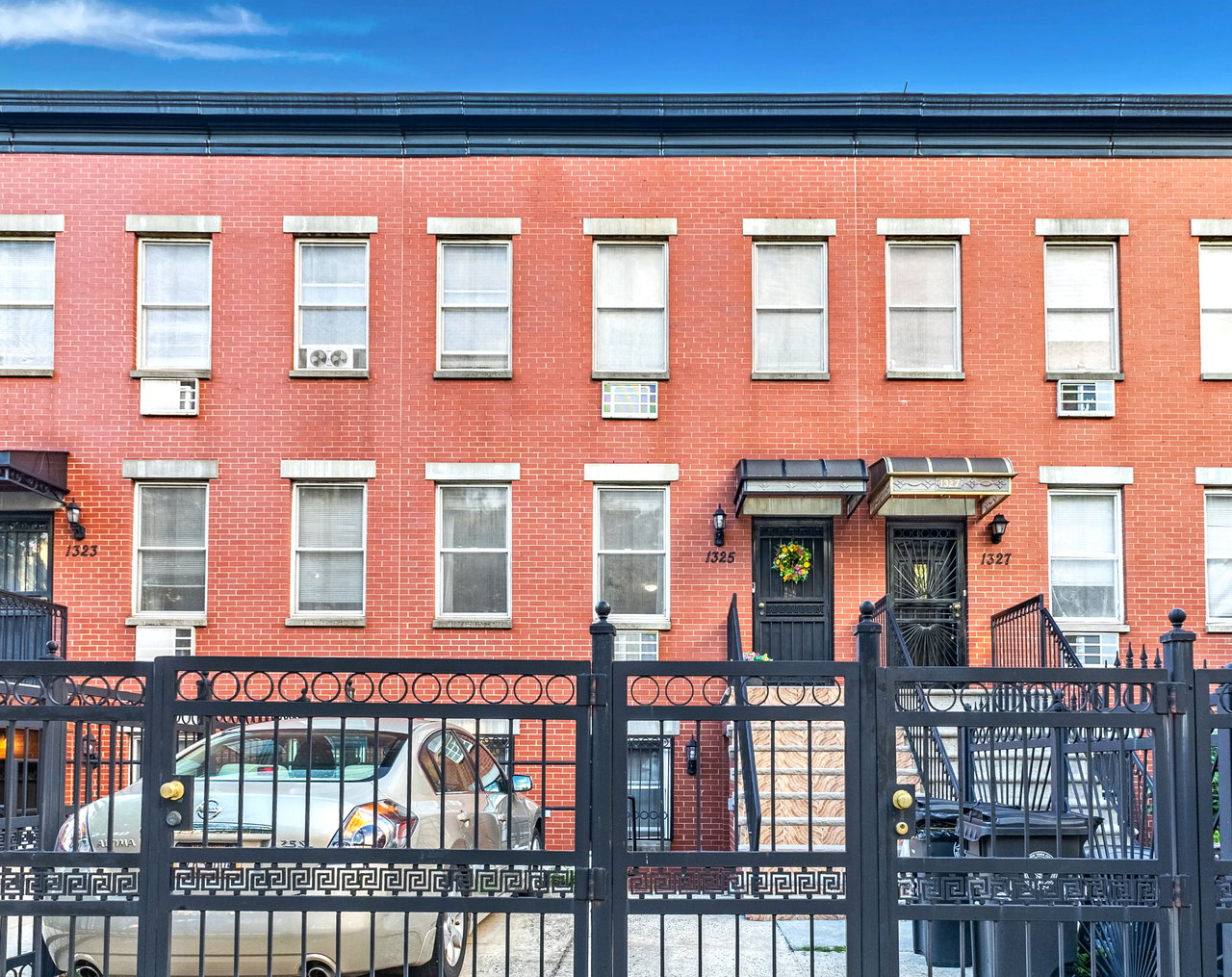 Exterior of 1325 Gates Avenue, a two-family home for sale in Bushwick, Brooklyn, offering a modern three-story design in one of Brooklyn's most sought-after neighborhoods.