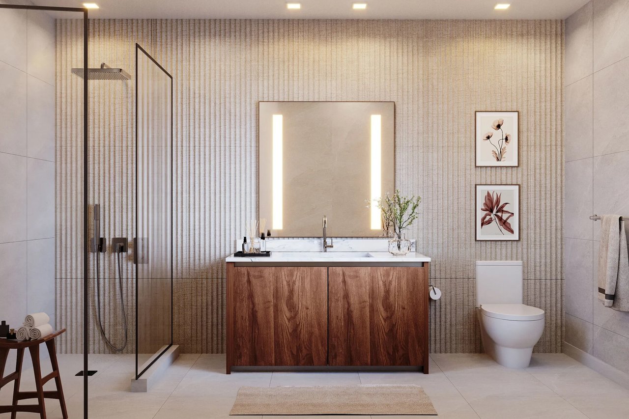 Rendering of a primary bathroom with glass shower at Ella Miami Beach.