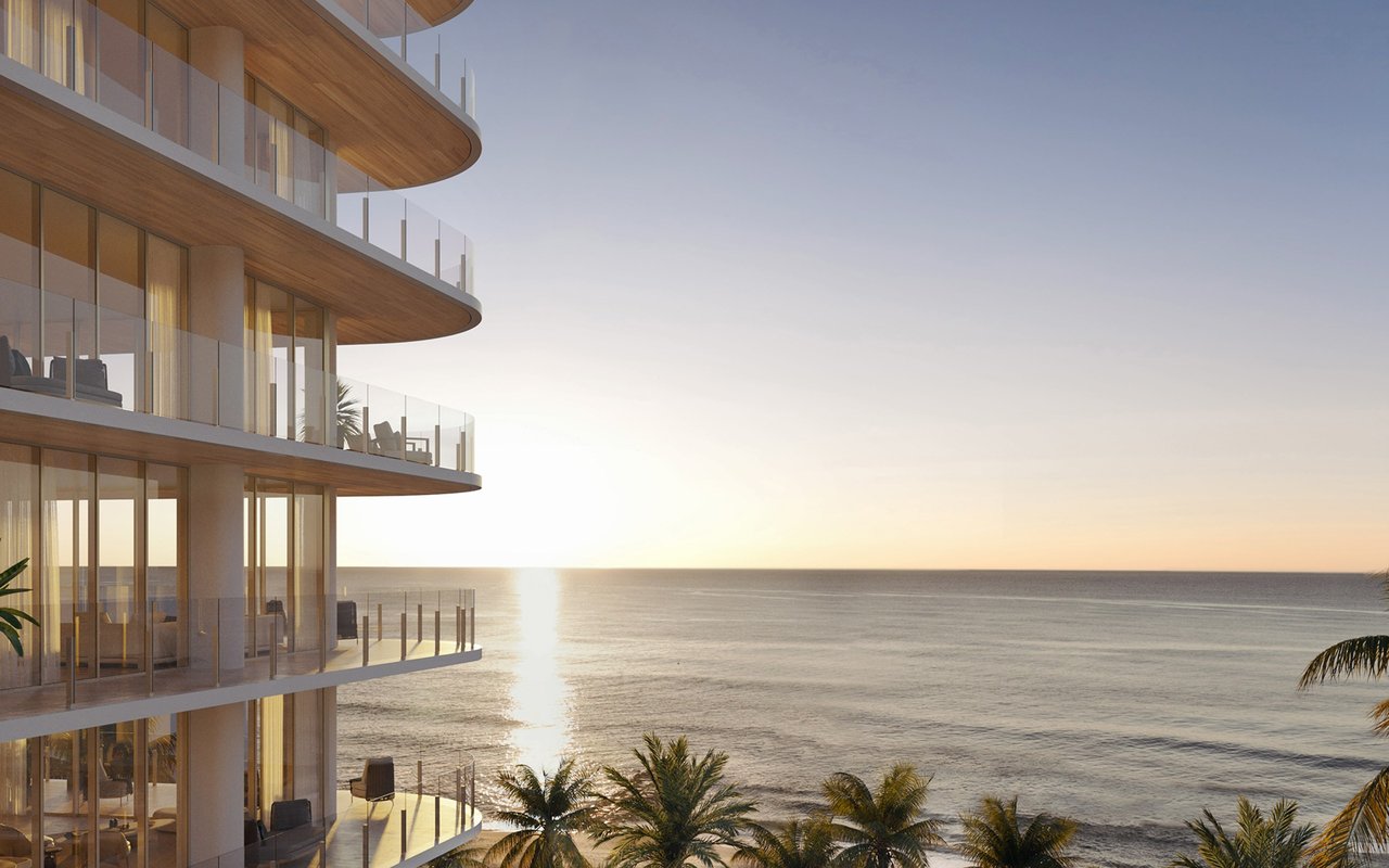 Ocean House Surfside ocean-facing façade and terrace rendering at sunrise.