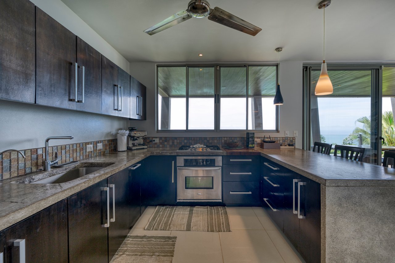 A Modern Jungle Haven with Panoramic Whales Tail Views