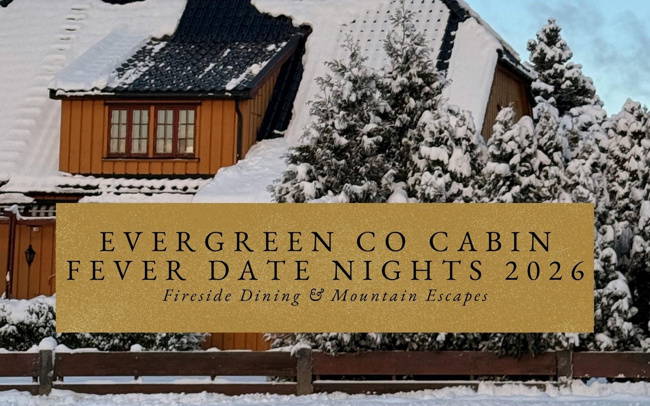 Cozy Evergreen cabin home exterior at night, snow-covered porch with fireplace glow visible through large windows