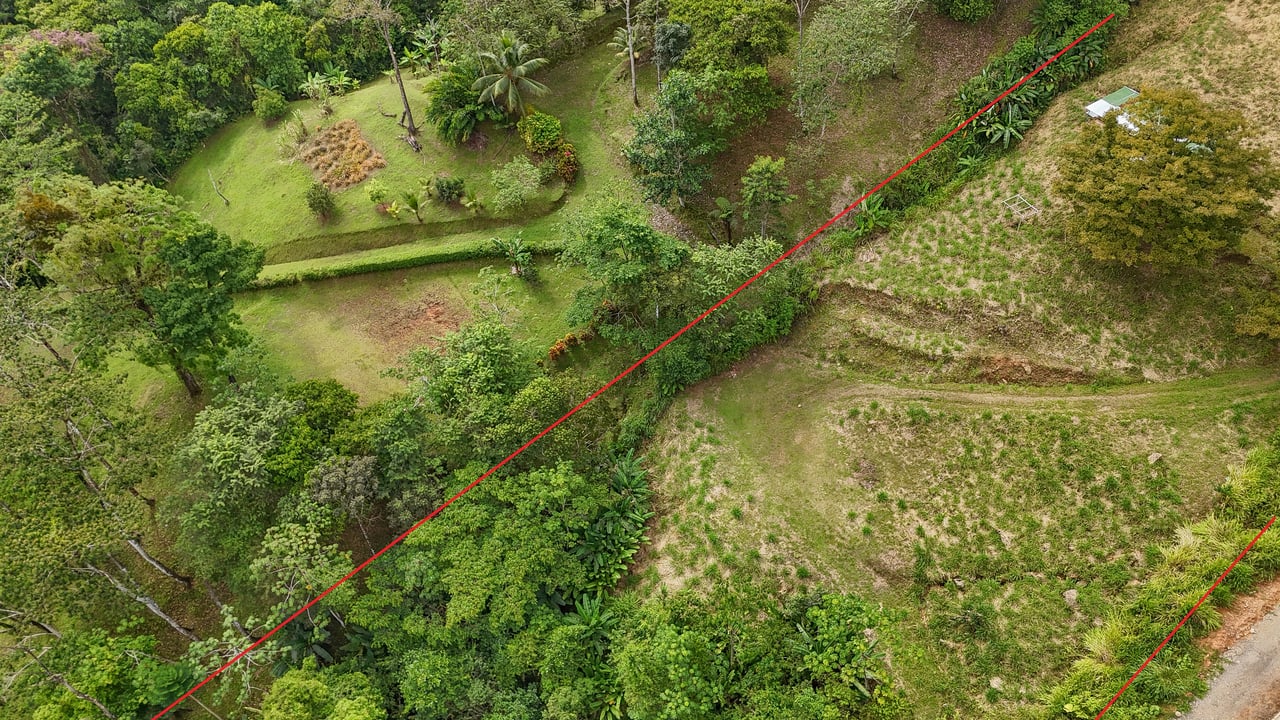 Jungle, Mountain & Valley View Lot with Two Large Plantels, Bordering a Crystal Mountain River with Swimholes & a Waterfall