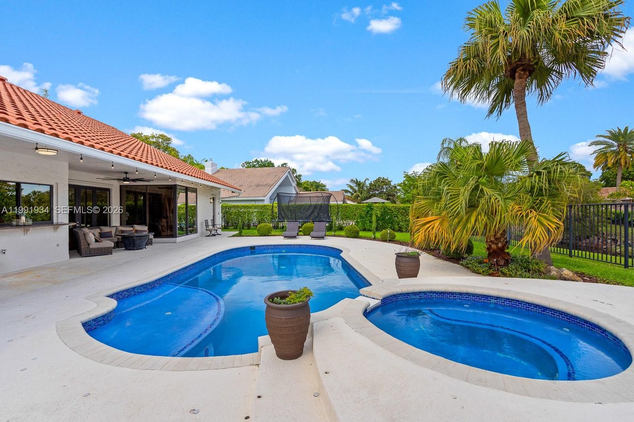 New To The Market: 8412 NW 52 Place, Coral Springs ​| Luxury Waterfront Pool Home in Pine Ridge For Sale