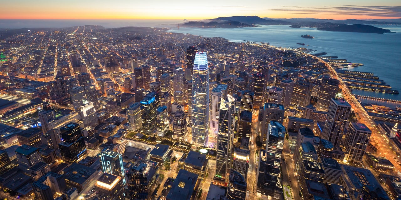 Aerial view of downtown San Francisco from above, showcasing SoMa neighborhood and surrounding city skyline.
