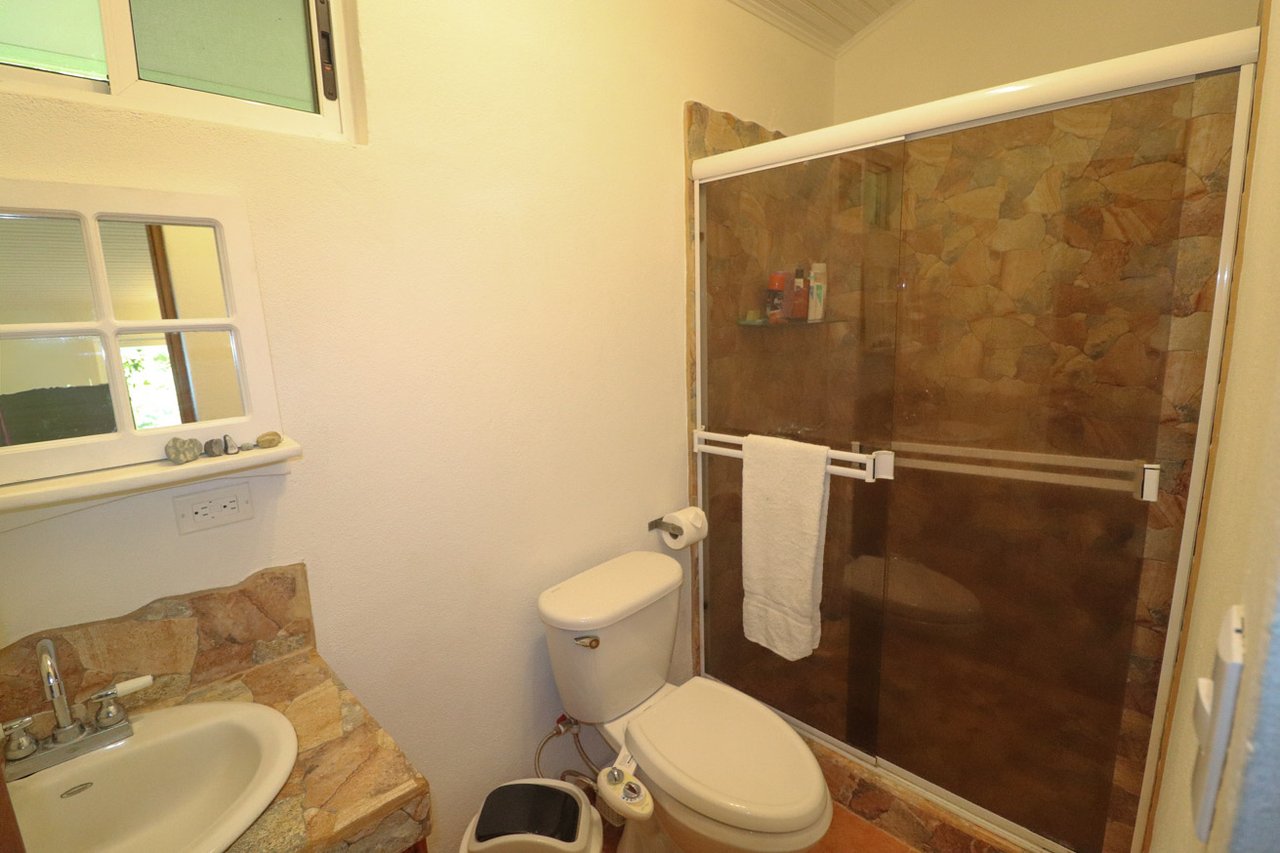 Ojochal Jungle Retreat for Sale with River, Pool, and Income-Generating Casitas
