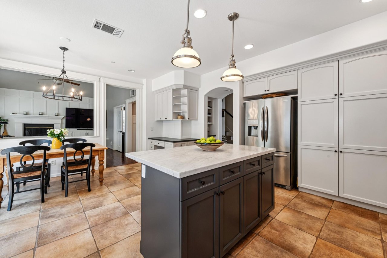 Refined dining room with seamless connection to the kitchen and living spaces.