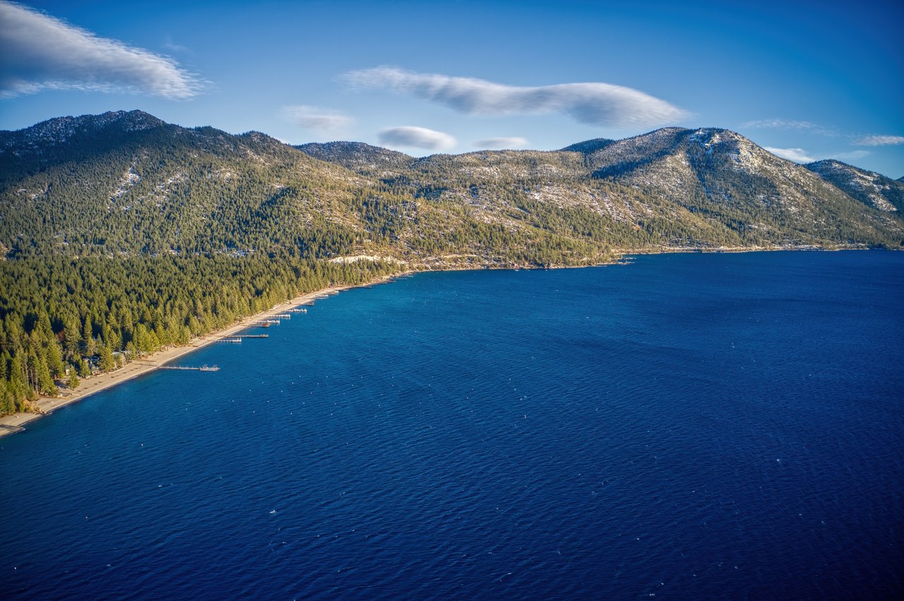 Scenic view of Lake Tahoe homes and shoreline comparing the communities of Incline Village and Glenbrook