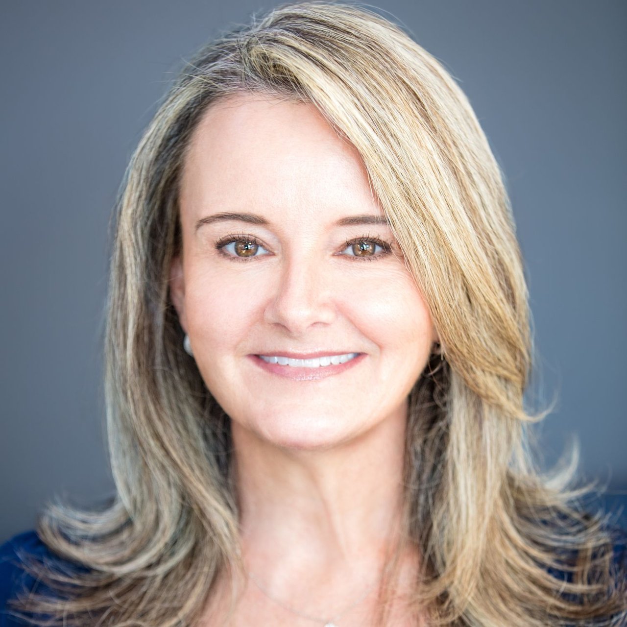Tiffany Baro Celebration, FL Real Estate Agent Headshot