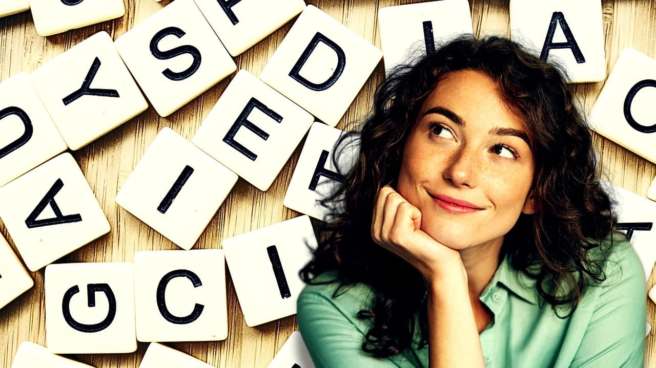 Portrait of a smiling woman resting her chin on her hand while looking upward, with scattered letter tiles in the background spelling words related to physical and medical topics.