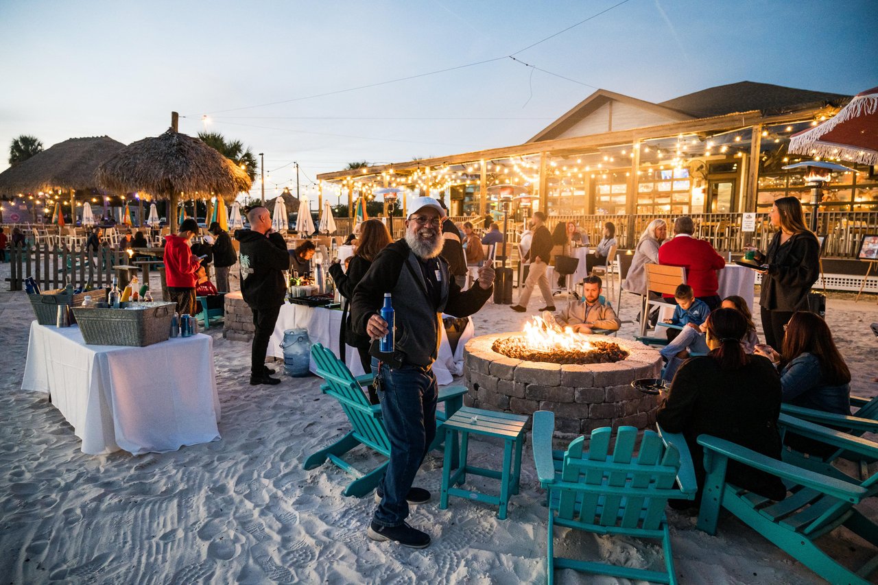 Beachfront restaurant seating and tropical atmosphere at Whiskey Joe's on Tampa Bay.