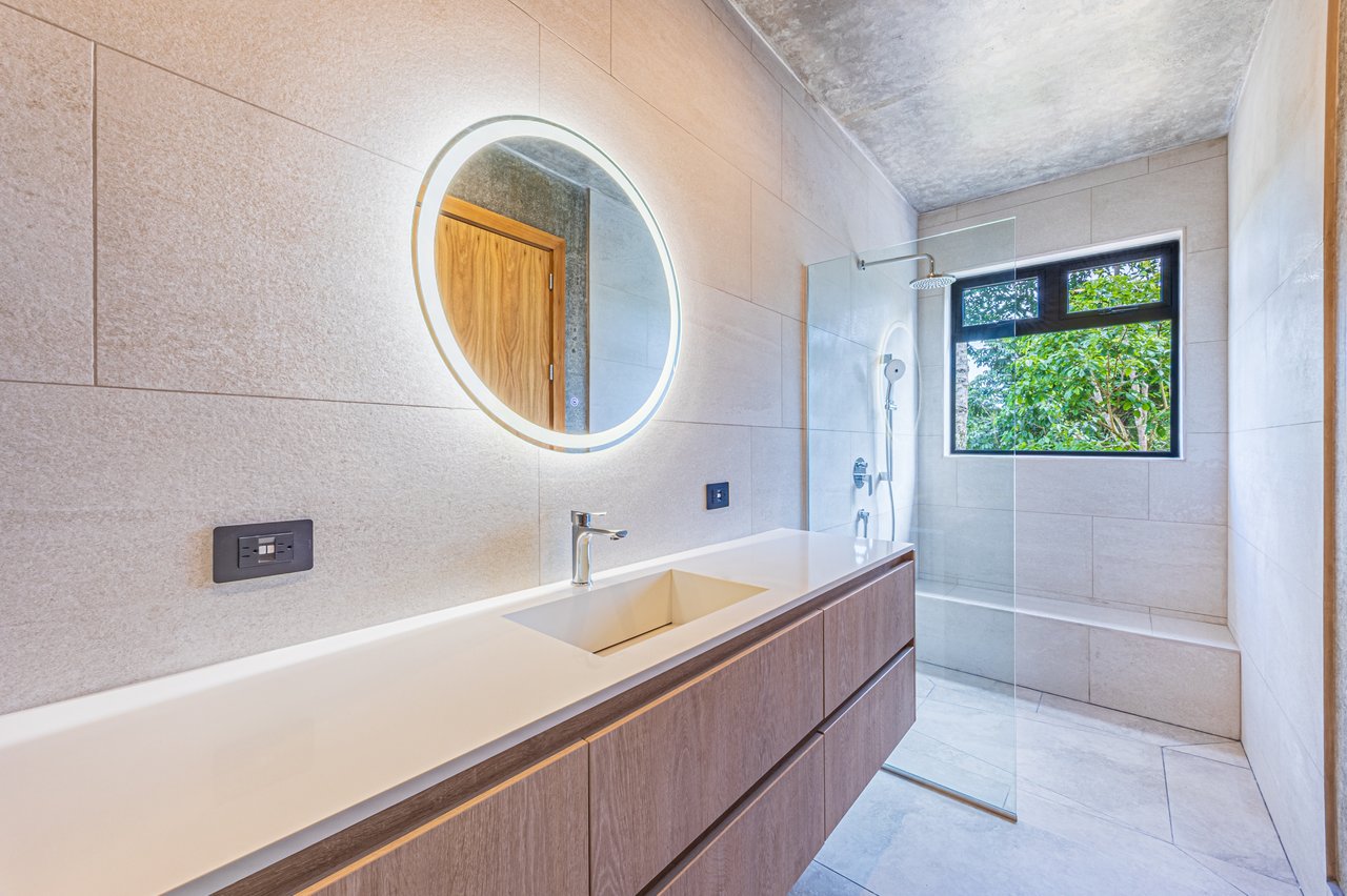 New contemporary tropical villa boasts with a movie theater and views of the iconic whale’s tail