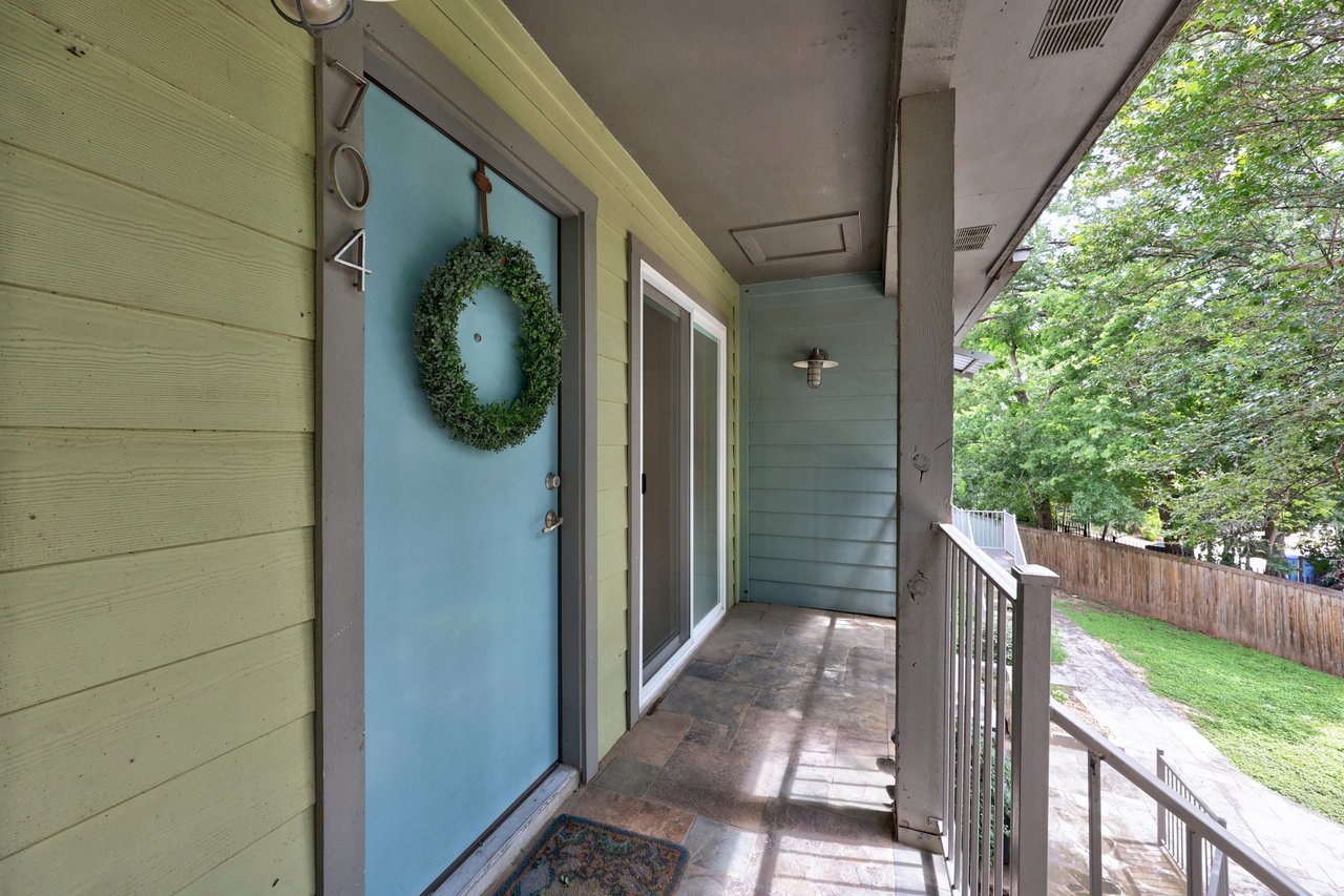 Top-Floor Condo Retreat in Gated Ivy Condos | Private Balcony + Tree-Filled Views