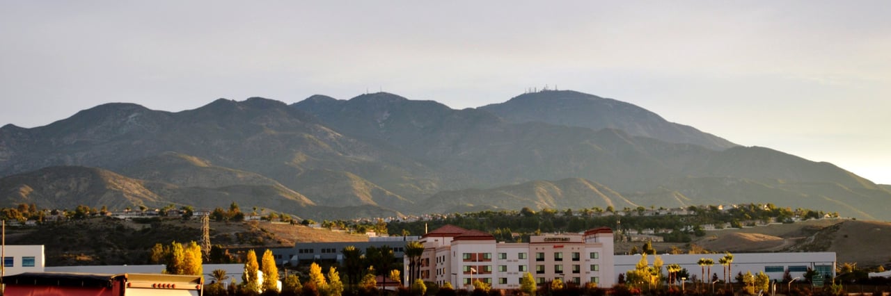 Saddleback above Foothill Ranch commercial buildings and Portola Hills homes in 2013