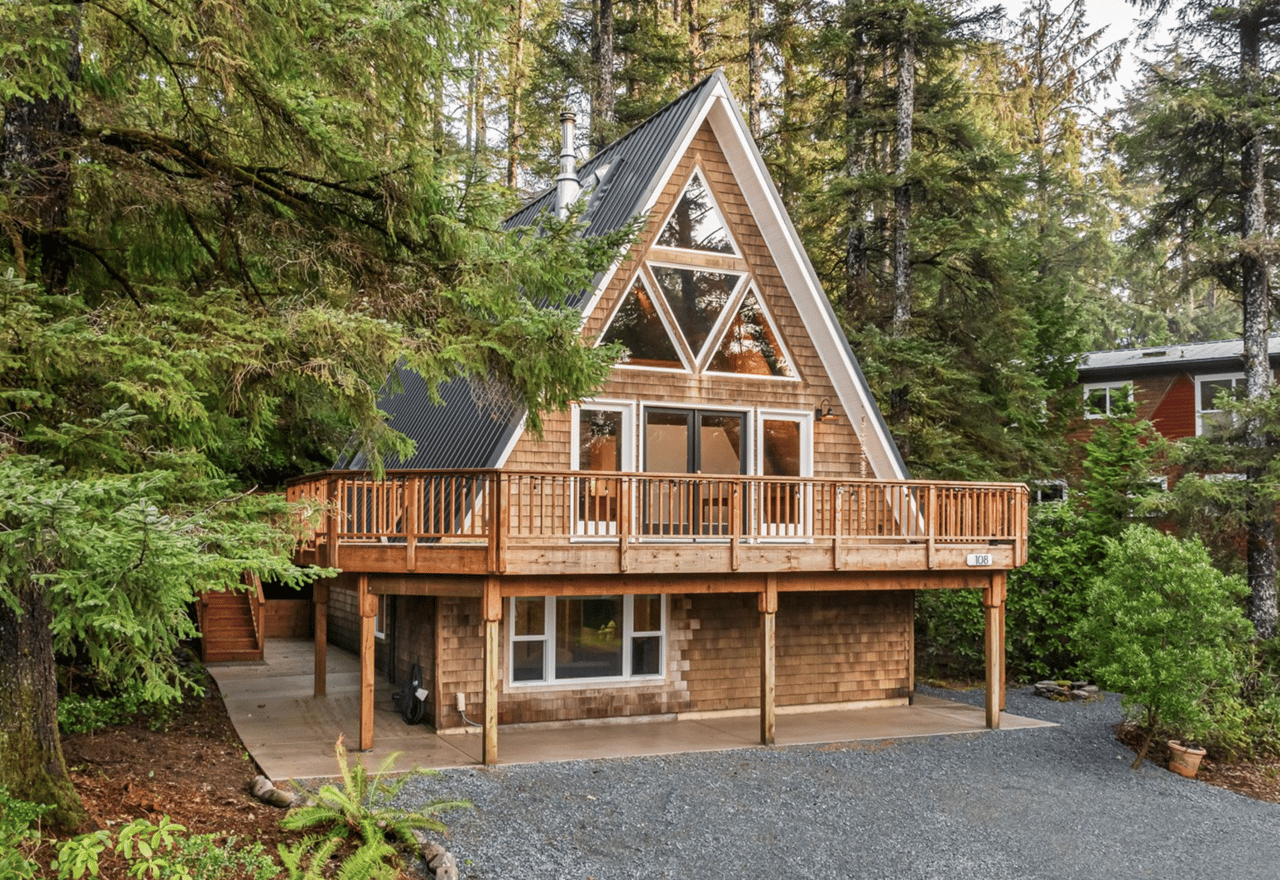 Sold A-frame coastal cabin at 108 College Ave in Manzanita Oregon surrounded by trees