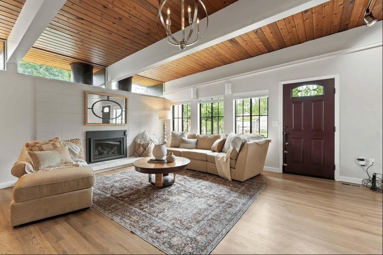 Open layout living room with large windows in Kokomo neighborhood Spokane Valley, wa