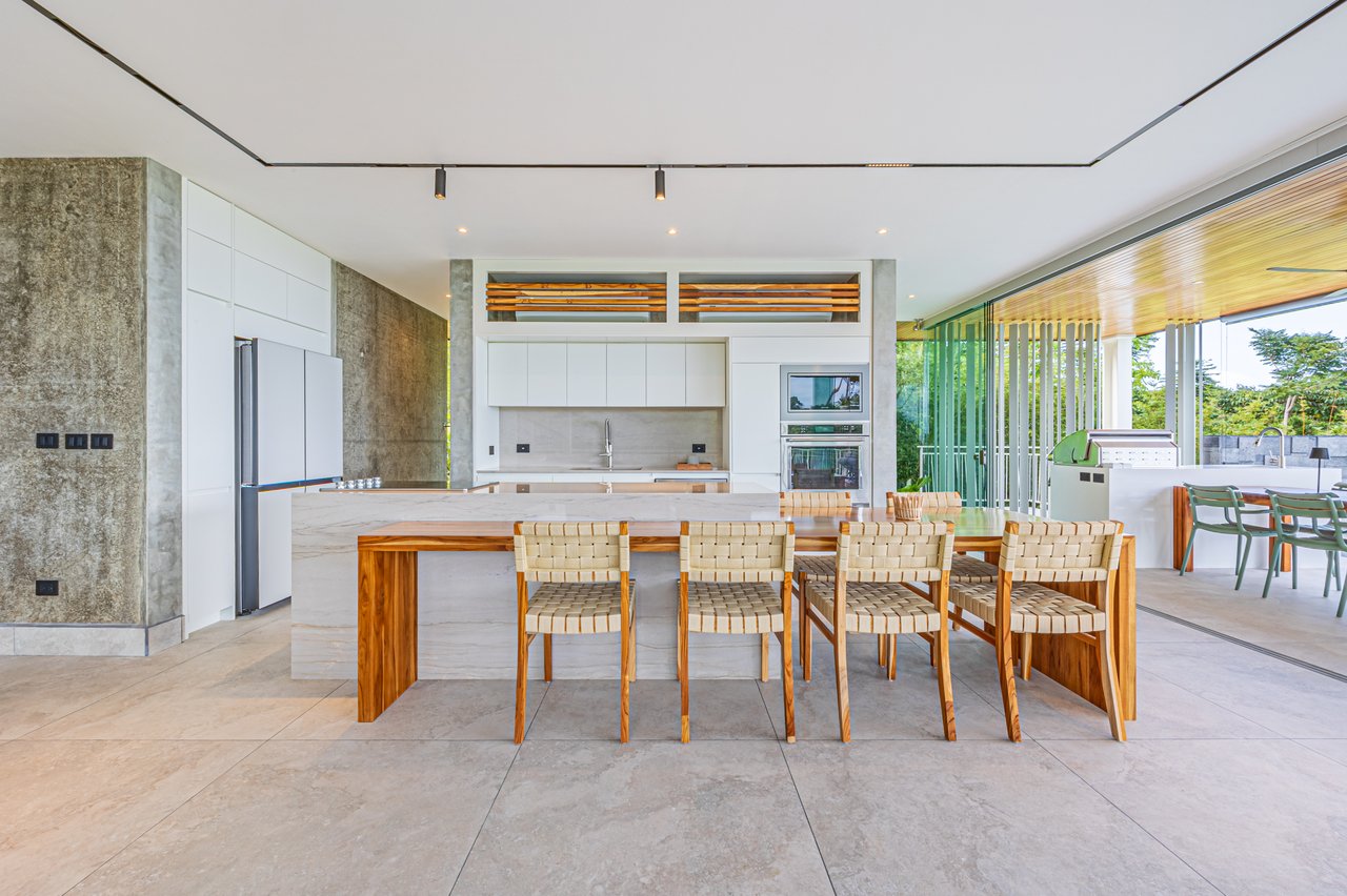 New contemporary tropical villa boasts with a movie theater and views of the iconic whale’s tail
