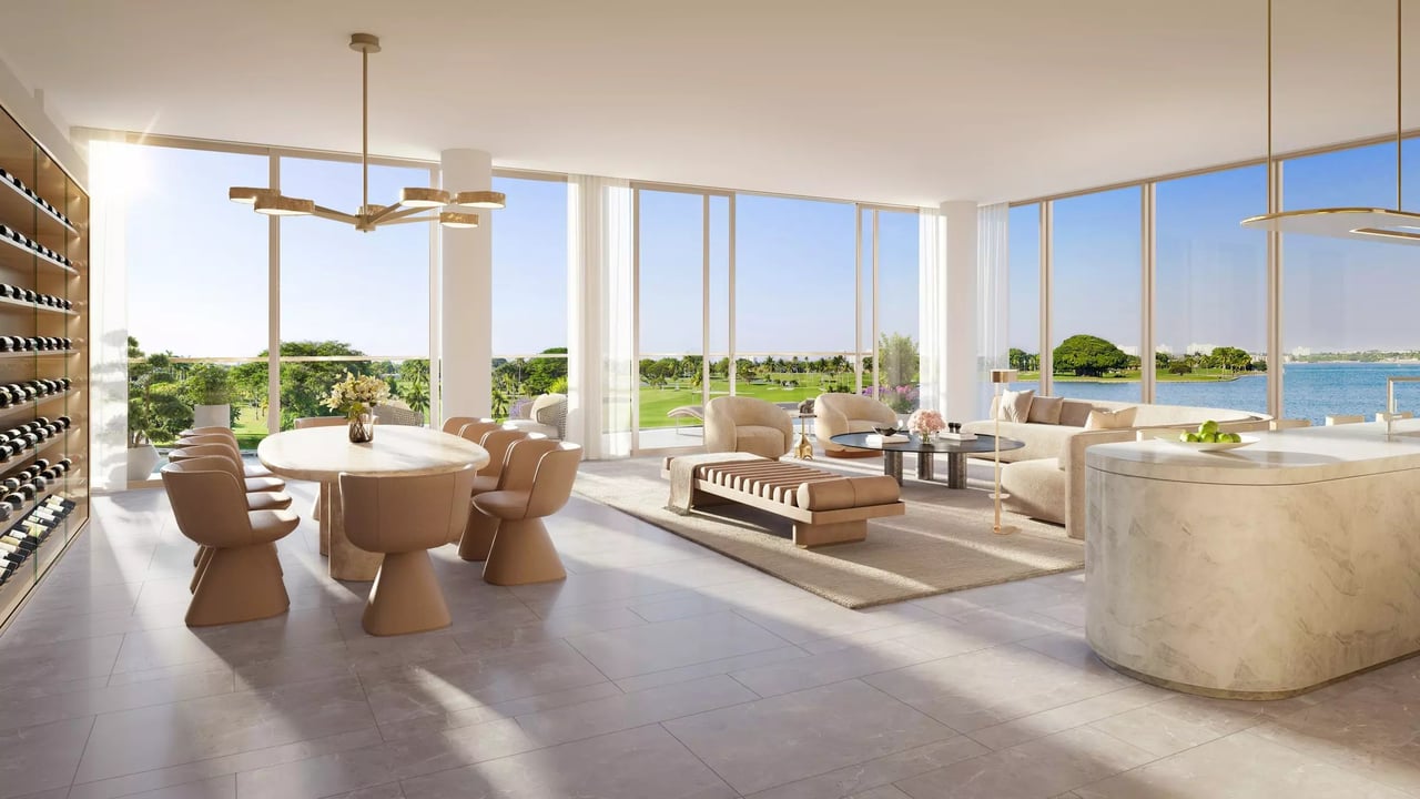 Rendering of the open living and dining area at Indian Creek Residences with water views.