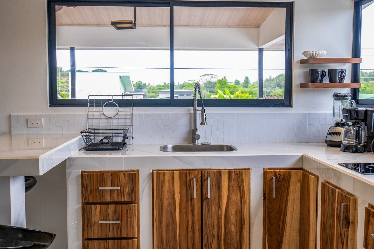 A House With An Upper Live-In Suite & Two Fully Serviced Downstairs Rental Apartments Less Than 1 km From The Entrance to Marino Ballena National Park