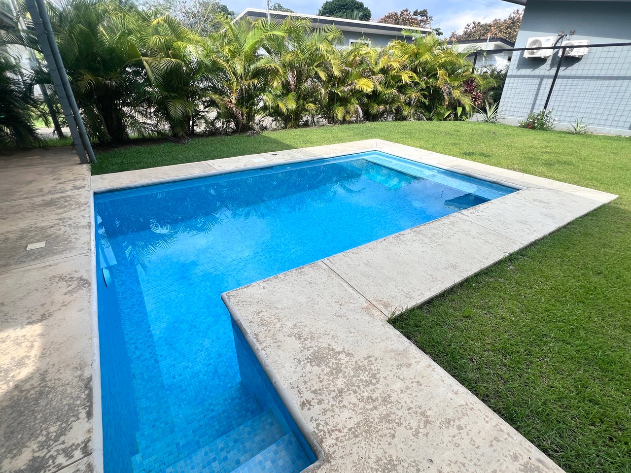 Quepos Hills Villa with pool and covered patio and tropical gardens