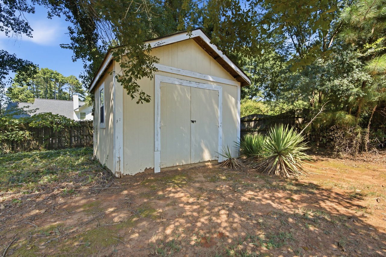 Full-Brick Beauty with Spacious Corner Lot & Private Fenced Backyard
