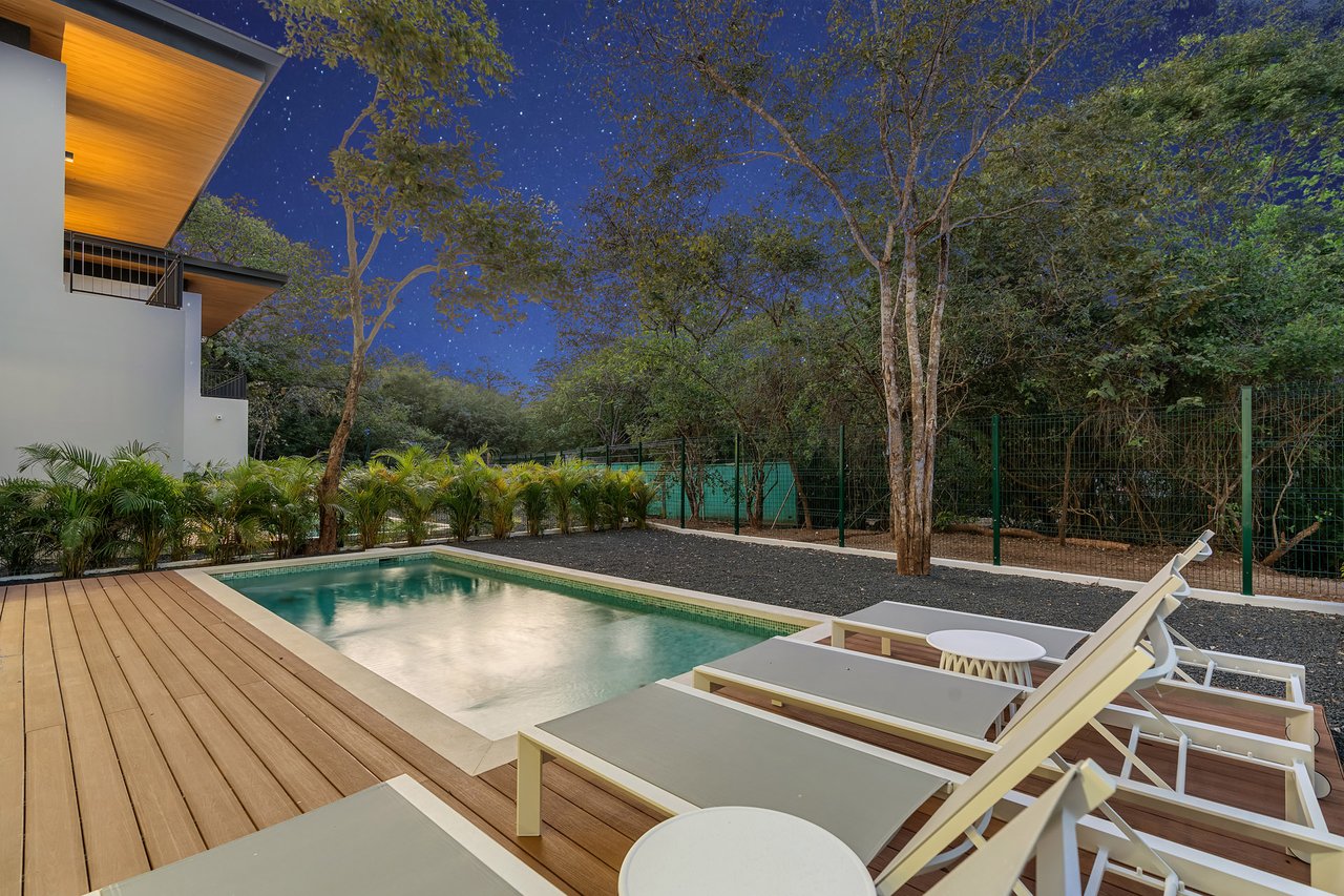 Villa Tropical Dawn | 4-Bedroom Modern Oasis in Bosques de Pinilla with Forest Views & Resort-Style Amenities