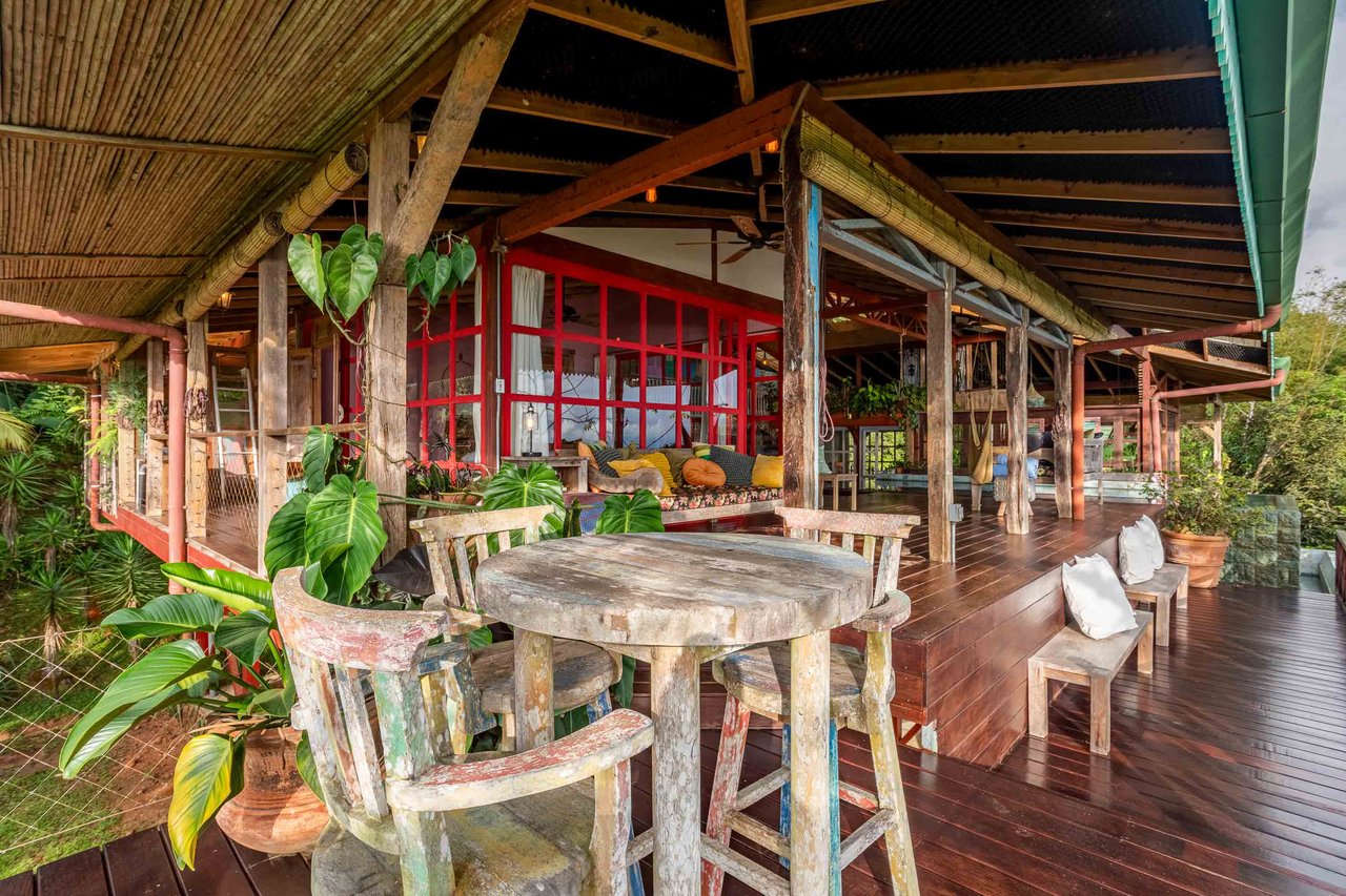 A Handcrafted Residence Immersed in Nature Above the Canopy Ocean View Architectural Home