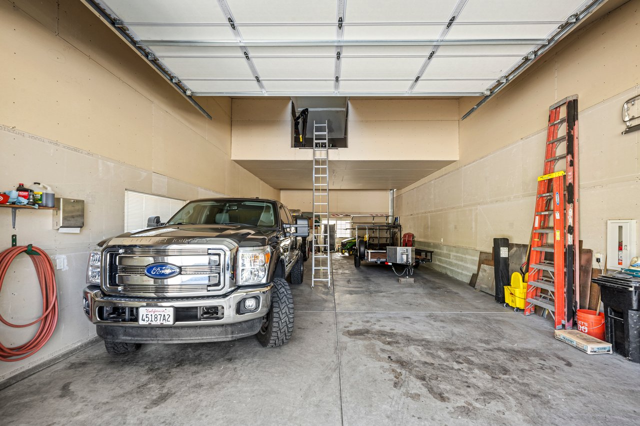 Custom Built Home on 4 Flat Acres in the Heart of Pleasant Valley – A Car Enthusiast's Dream!