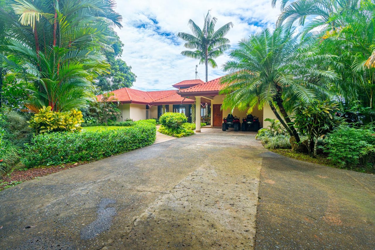 Ocean, jungle & mountain views on a meticulously landscaped 3-home family compound