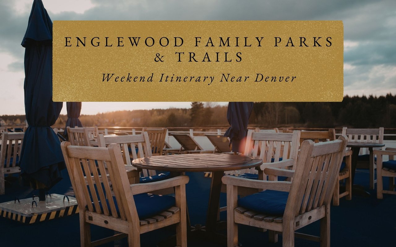 Couple dining on an outdoor patio at sunset in Greenwood Village, Colorado, with string lights overhead.