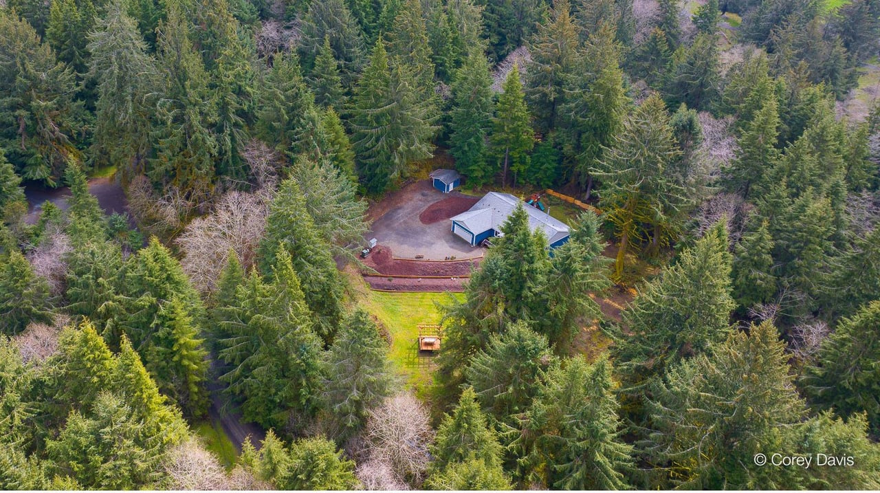 Sold Craftsman home at 38265 Hiagua Ln in Nehalem Oregon represented by Leisha Mizee-Riggert of Home + Sea Realty