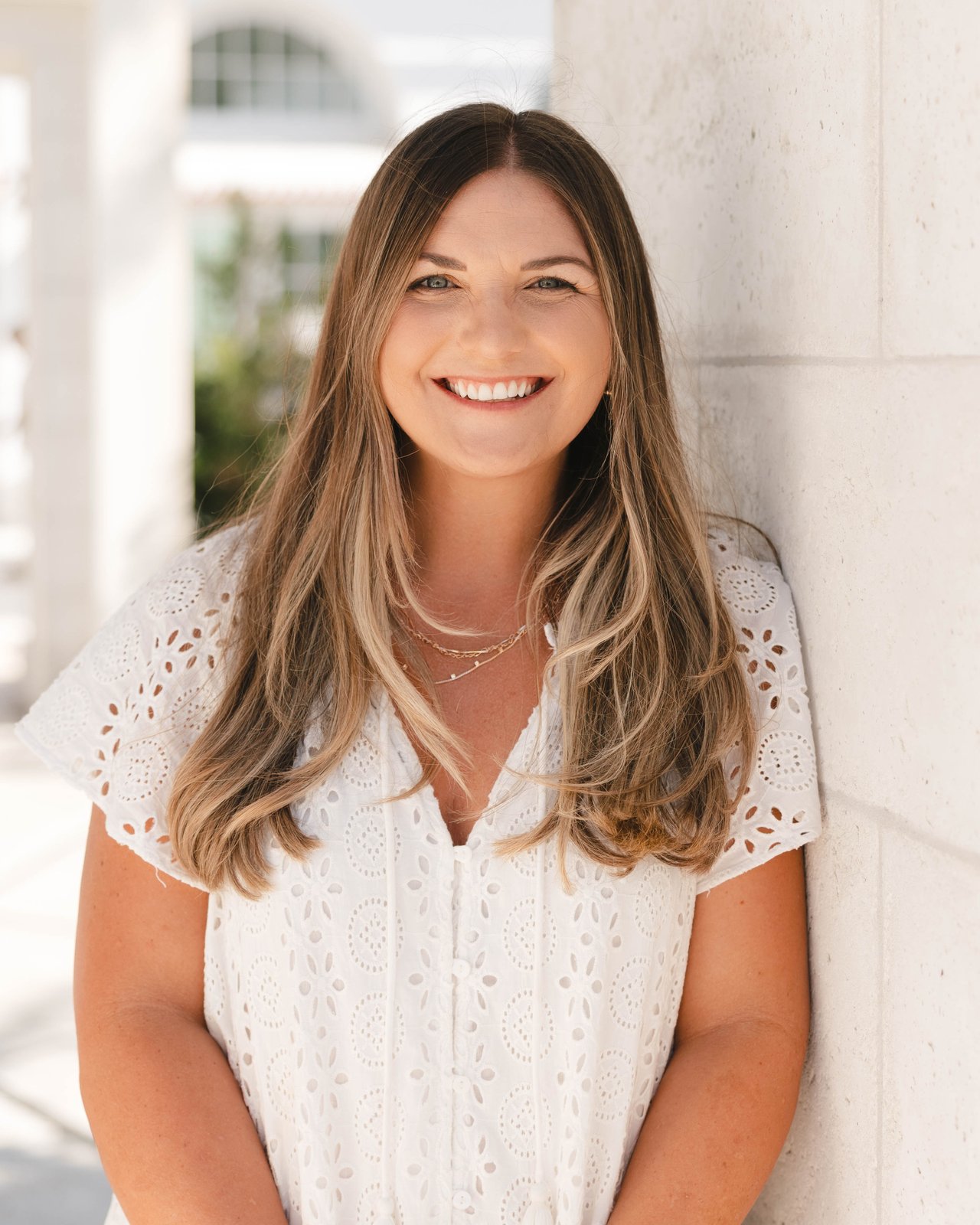 Leslie Evans, director of operations for The Kendall Hood Collection, smiling in professional portrait